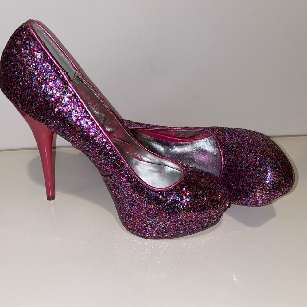 Pink glitter platform 5.5 inch heels. New. Size 8.